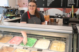 Girl serving ice cream